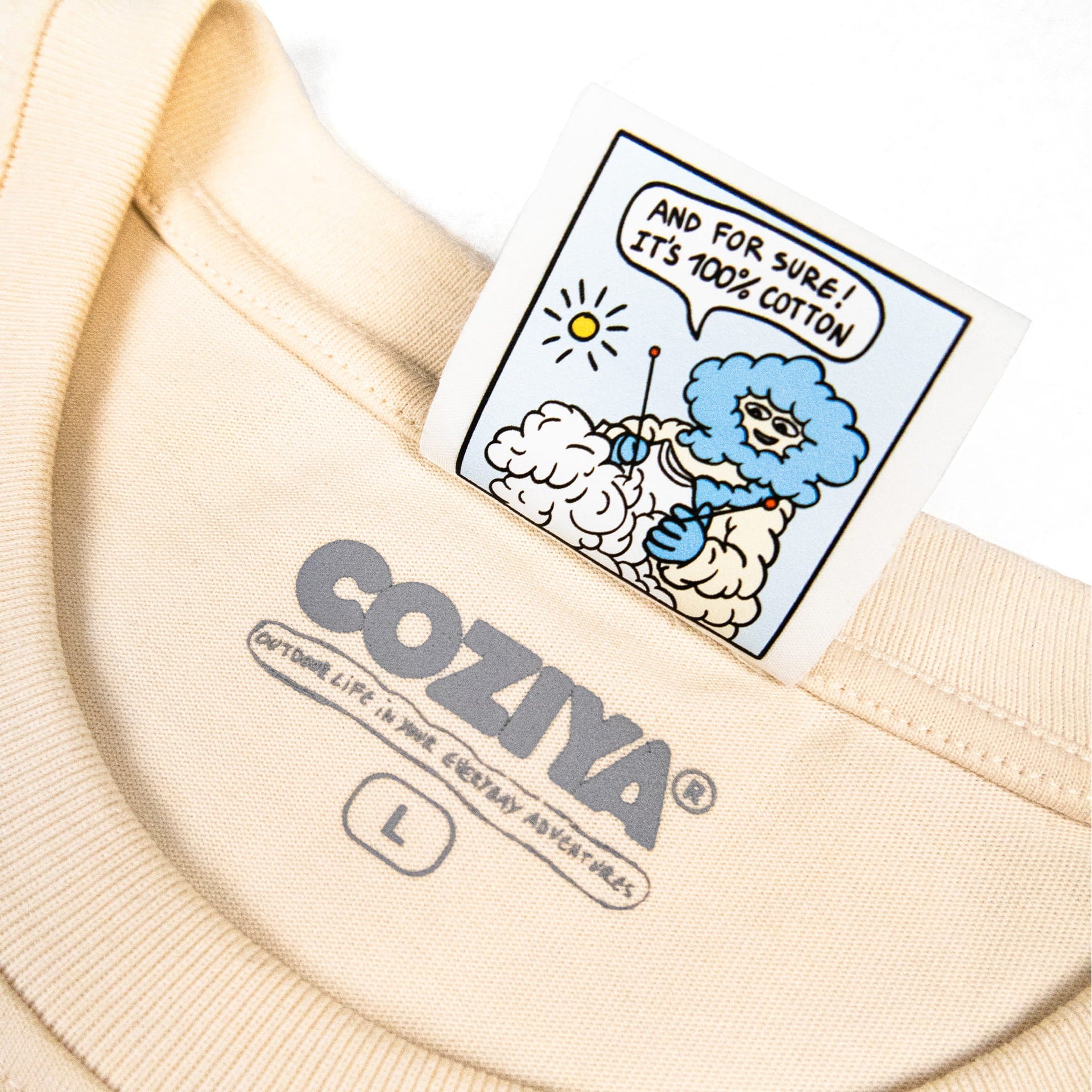 Coziya Cloud 3D logo tee comic-strip woven label neck detail