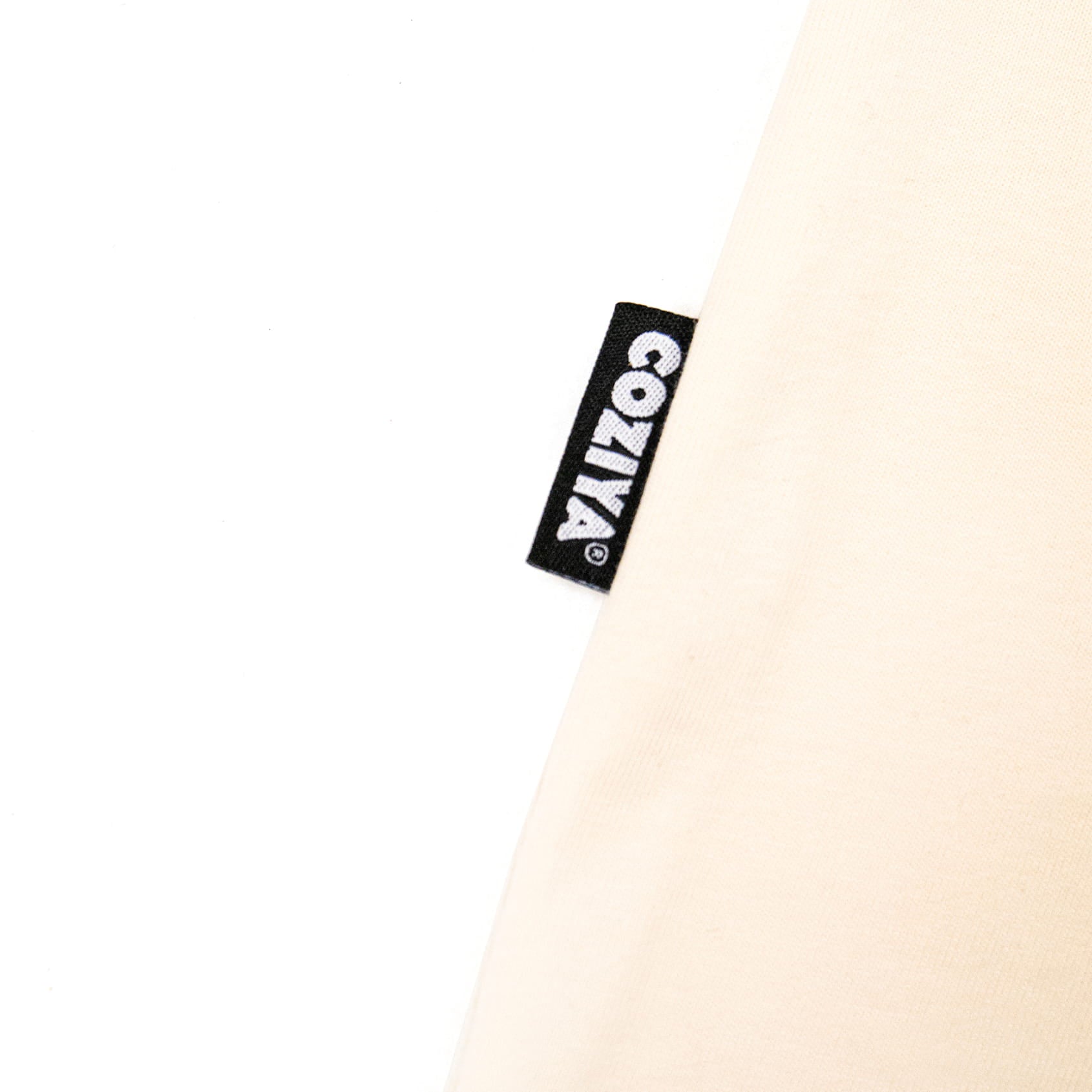 Coziya Cloud 3D logo tee lateral woven label detail
