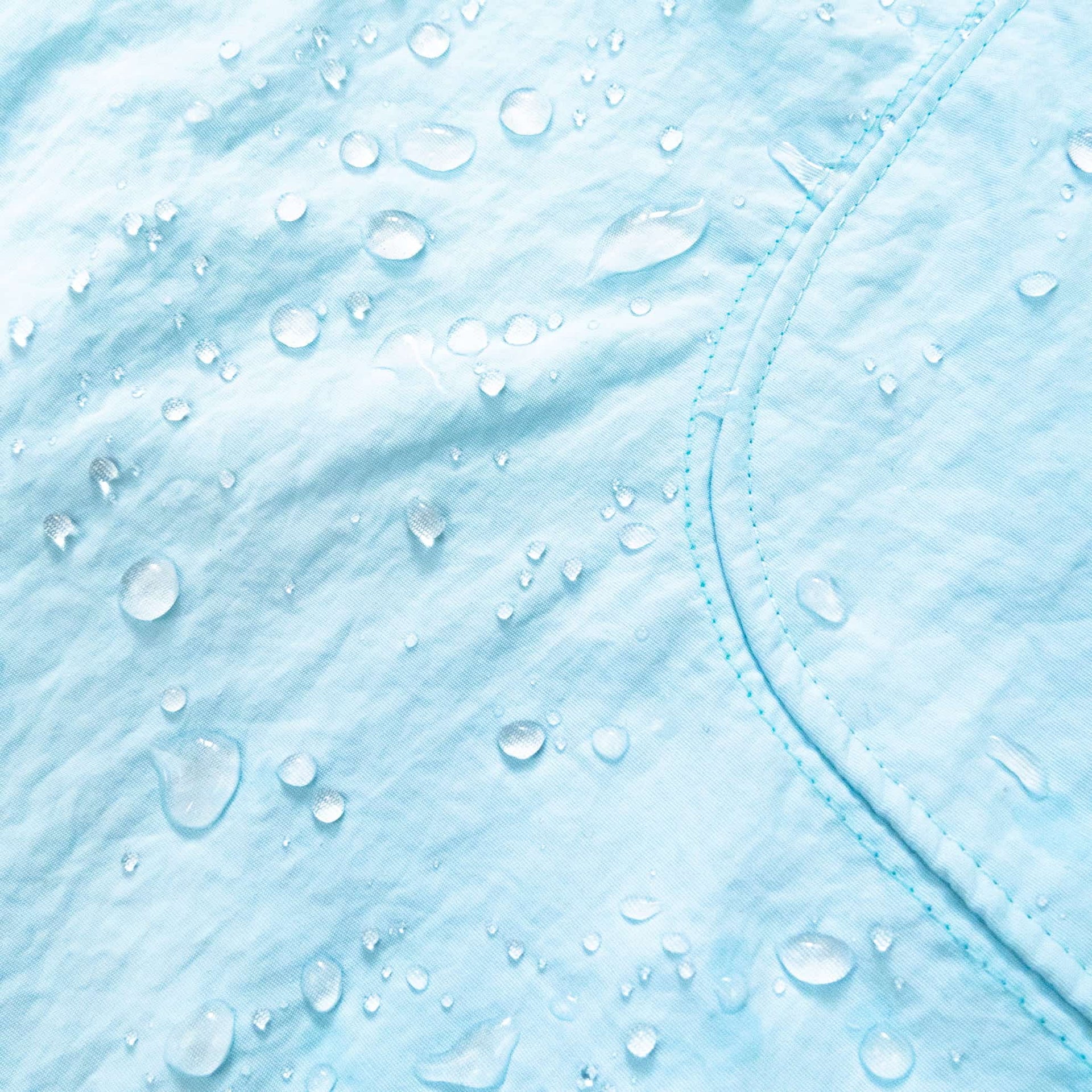 Coziya blue swim trunks water-repellent fabric droplet test close-up