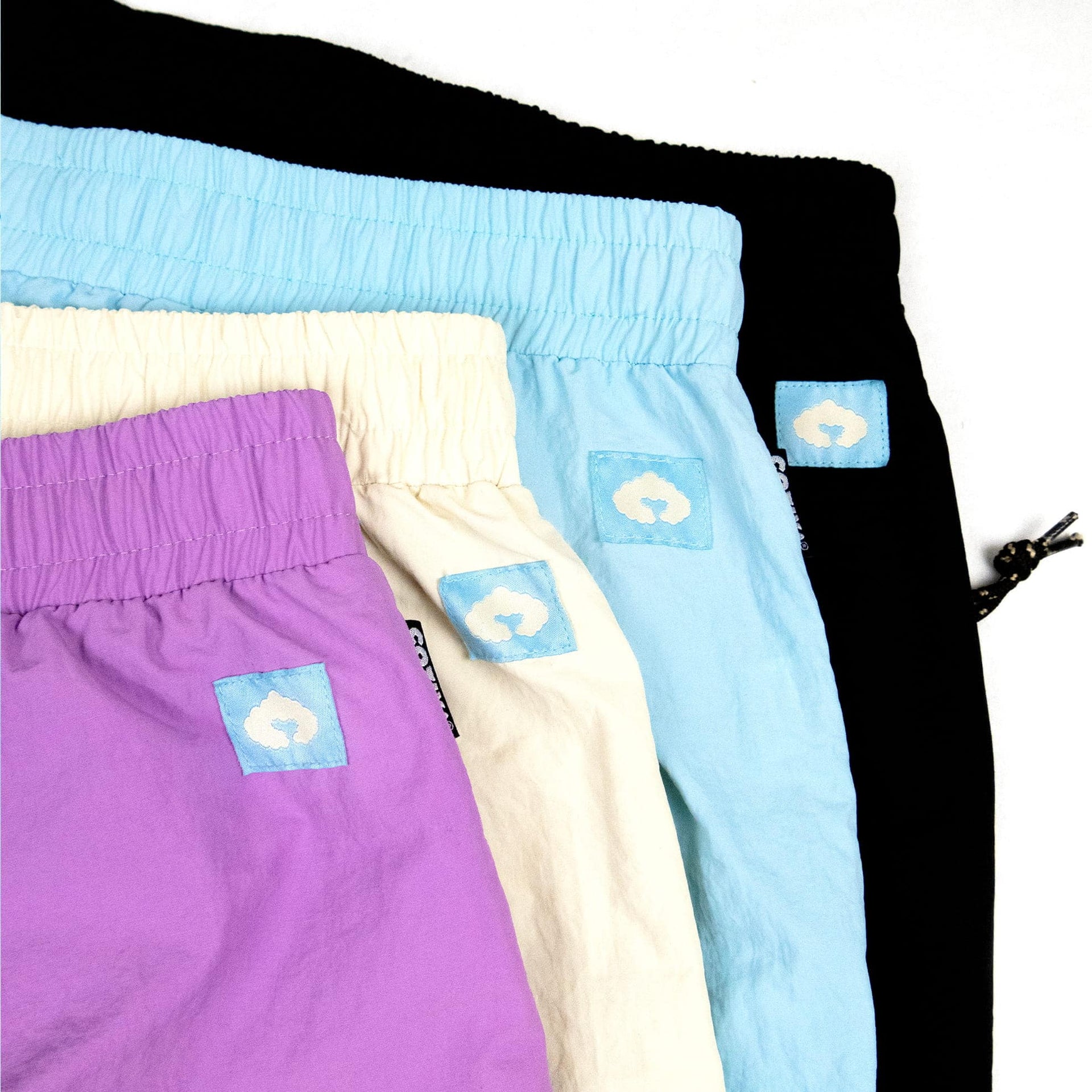 Coziya versatile swim trunks label and drawstring waistband detail