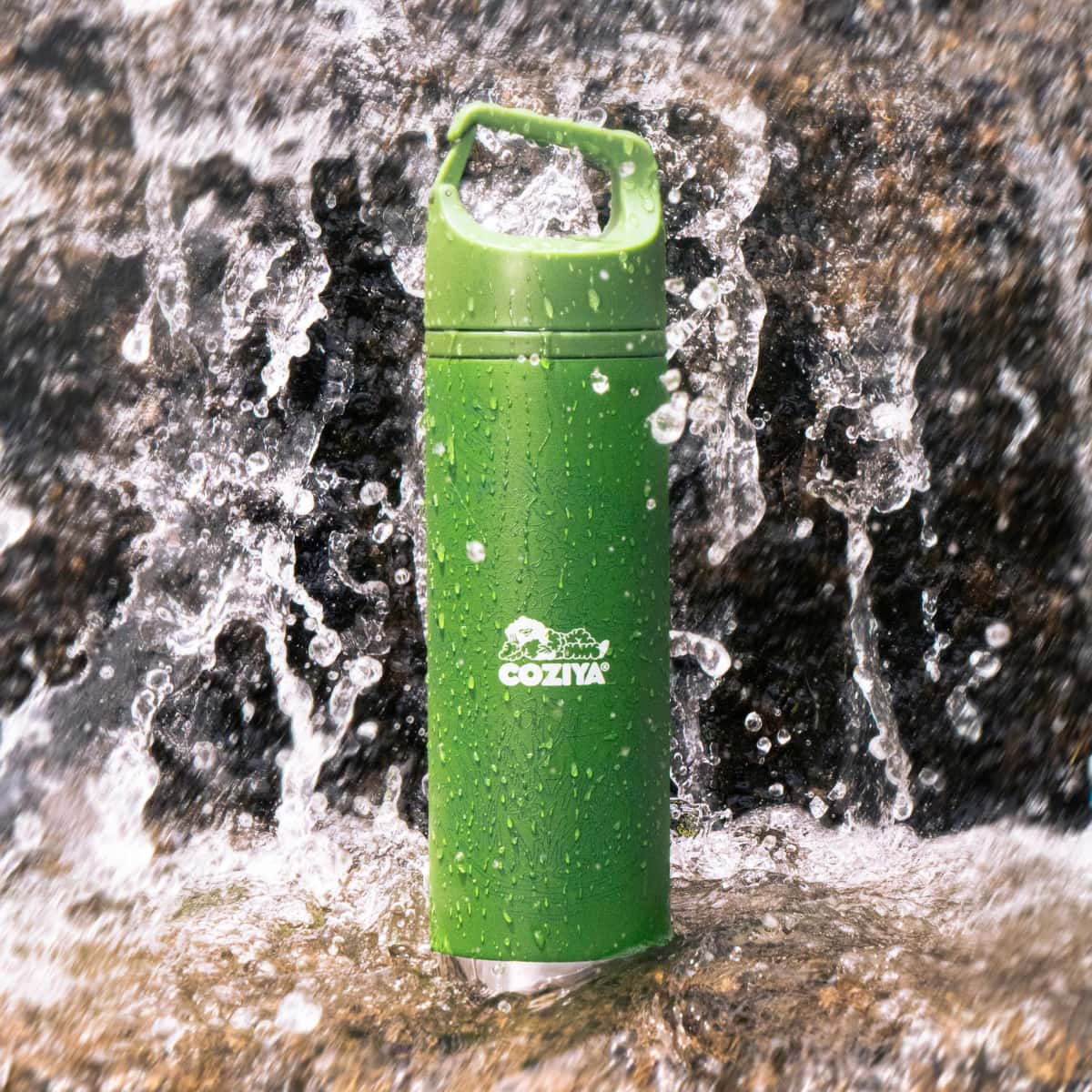 Coziya Hook650 insulated water bottle kept cold at the beach lifestyle shot