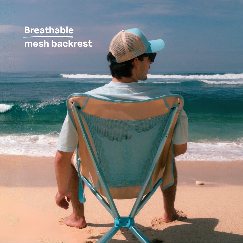 Coziya Cloud Chair compact camping chair at the beach lifestyle shot