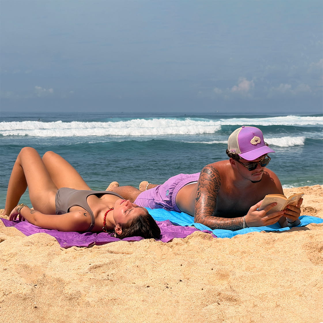 Coziya Air Towel microfiber beach towel laid flat on beach lifestyle shot