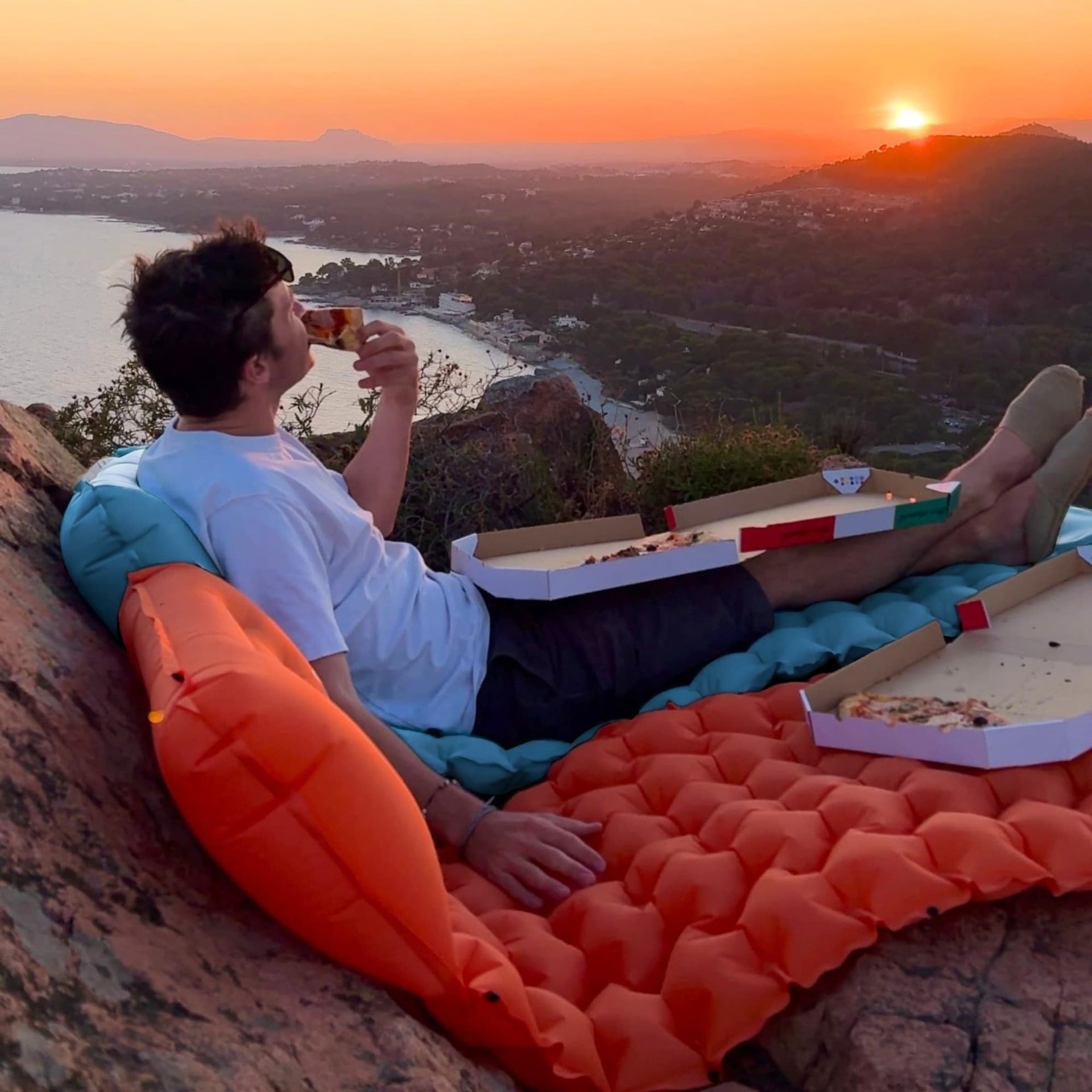 Coziya inflatable sleeping pad sunset cliff view outdoor adventure lifestyle