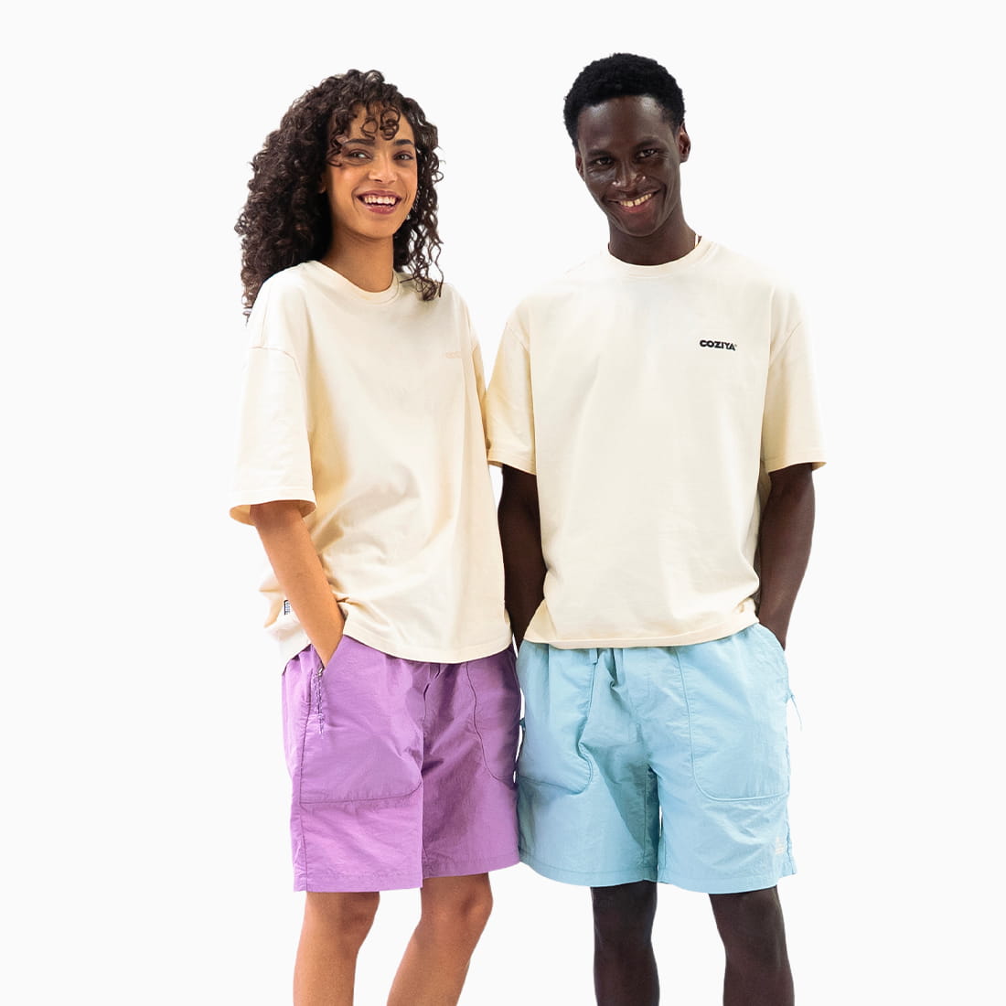 Coziya swim trunks blue and purple worn by man and woman outdoor full view