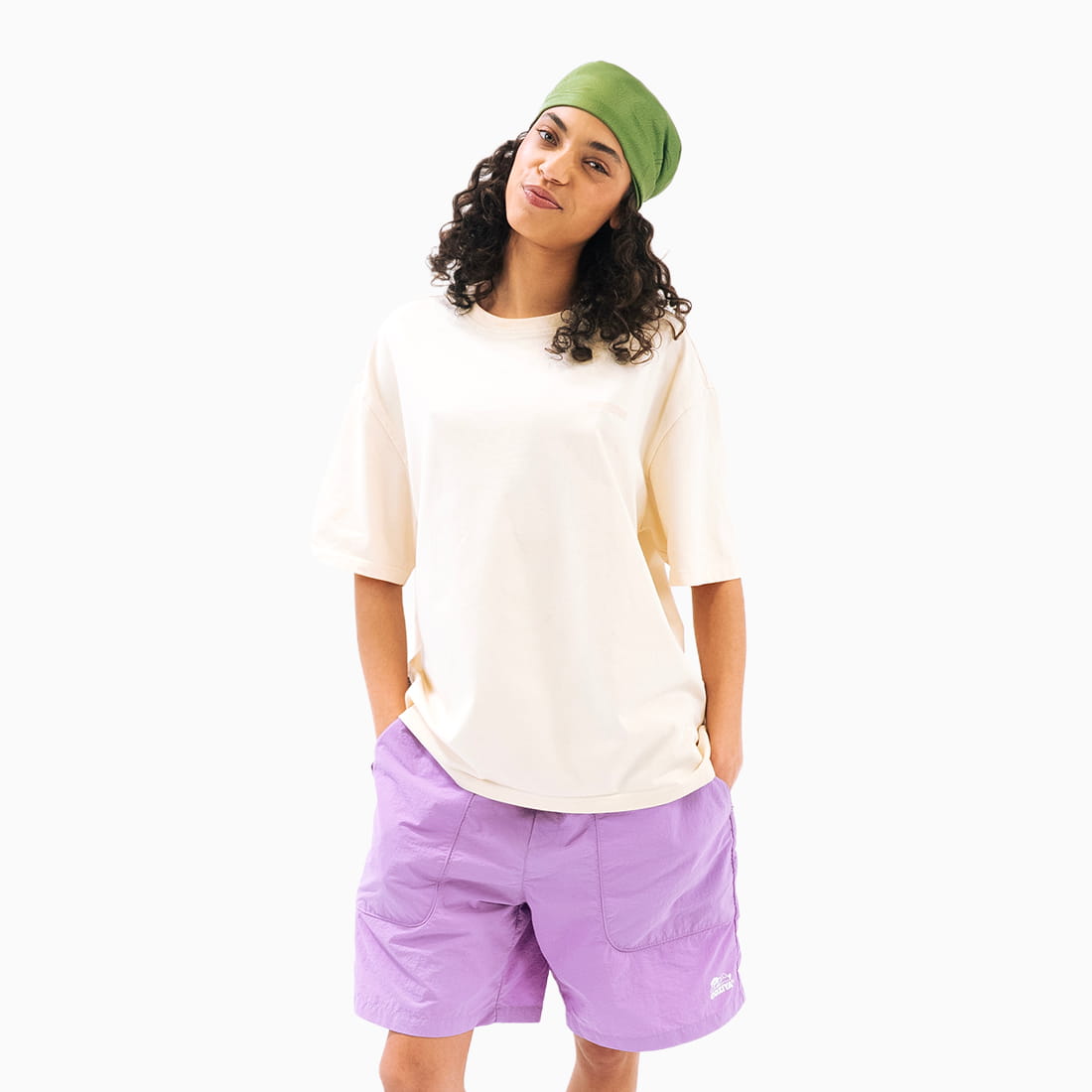 Coziya Mystery Island cream graphic tee worn by woman relaxed fit lifestyle